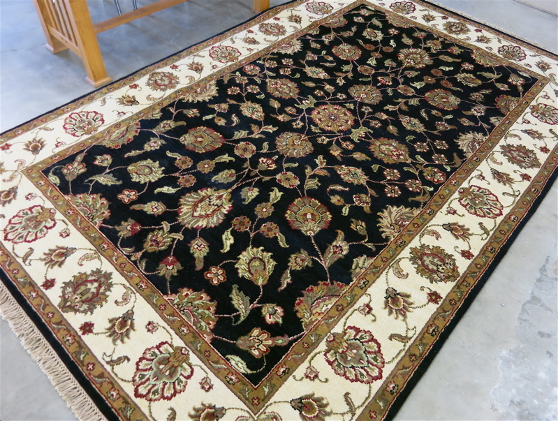 Appraisal: HAND KNOTTED ORIENTAL CARPET Indo-Persian floral Isfahan design on rectangular