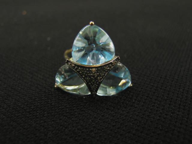 Appraisal: Blue Topaz Diamond Ring triangular gems carats highlighted by diamonds