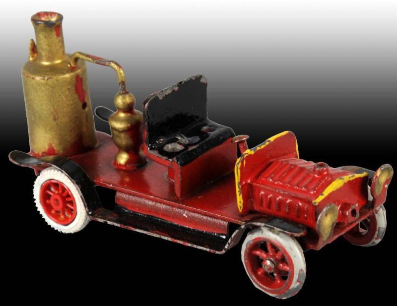 Appraisal: Small Cast Steam Fire Truck Description Believed to have been