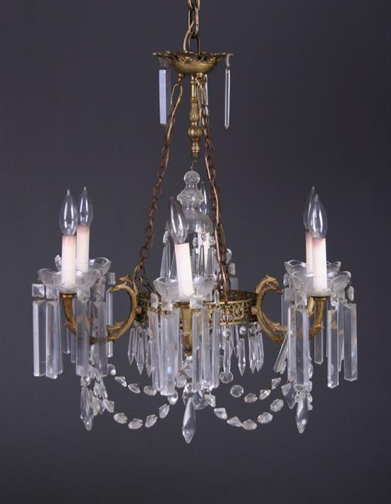 Appraisal: EMPIRE STYLE GILT-METAL AND CRYSTAL SIX-LIGHT CHANDELIER Early th century