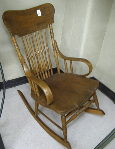 Appraisal: VICTORIAN PRESSED-BACK ROCKER American late th century the back having