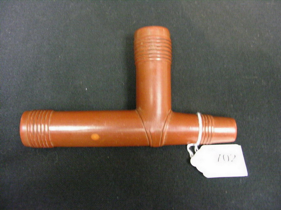 Appraisal: NATIVE AMERICAN CATLINITE T-BOWL PIPE Nice older pipe with carved