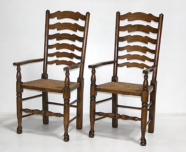 Appraisal: A pair of mixed hardwood ladderback armchairs th century height