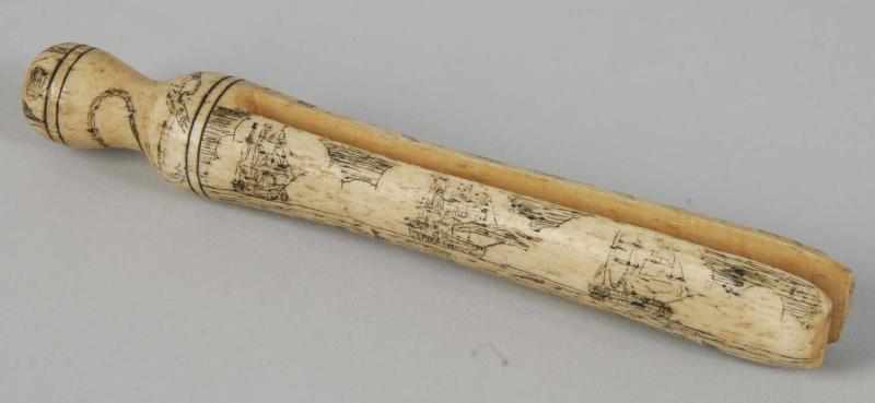 Appraisal: Scrimshaw Clothespin Description Circa to Turned and carved whale rib