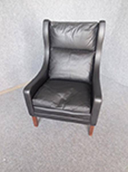 Appraisal: DANISH BLACK LEATHER ARMCHAIR