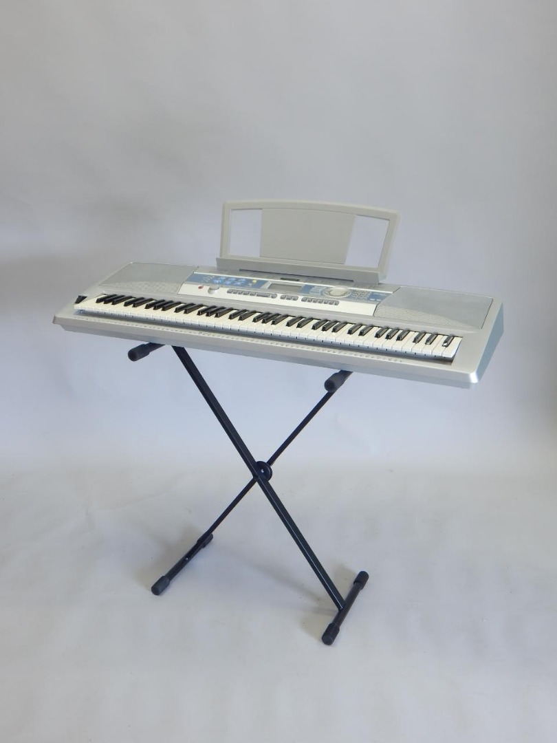 Appraisal: A Yamaha portable grand piano DGX- the stand cm wide