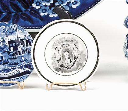 Appraisal: Black transferware cup plate Decorated with Lafayette Crowned at Yorktown