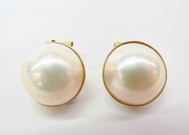 Appraisal: A pair of fine mabe pearls mounted in an K