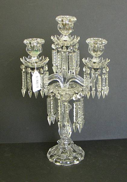 Appraisal: A Baccarat molded glass three light candelabra in the 'Medallion'