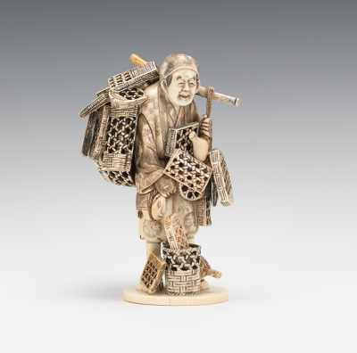 Appraisal: A Carved Ivory of a Basket Weaver This very finely