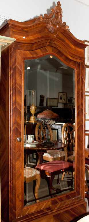 Appraisal: French walnut armoire with beveled mirrored glass door Estimate -