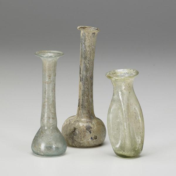 Appraisal: ROMAN GLASS BOTTLES Two candlestick green glass unguentaria and one