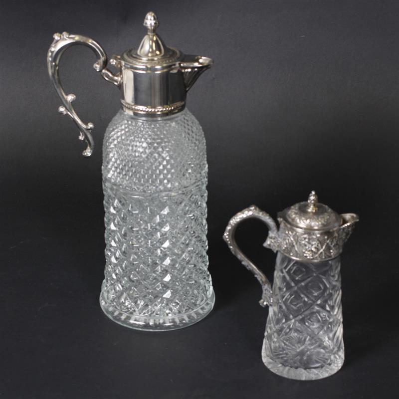 Appraisal: Pair of lidded silver plated cut crystal claret jugs Larger