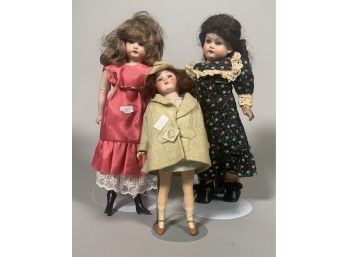 Appraisal: Three antique bisque head dolls including one diminutive Simon Halbig