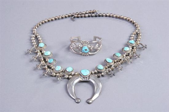 Appraisal: NAVAJO TURQUOISE AND STERLING SILVER SQUASH BLOSSOM NECKLACE AND CUFF