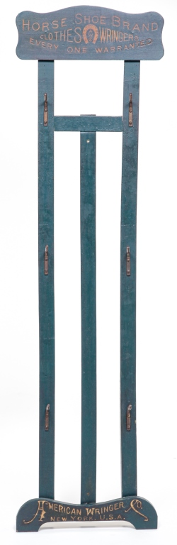 Appraisal: AMERICAN HORSEHOE BRAND ADVERTISING COAT RACK Ca Green-painted soft wood