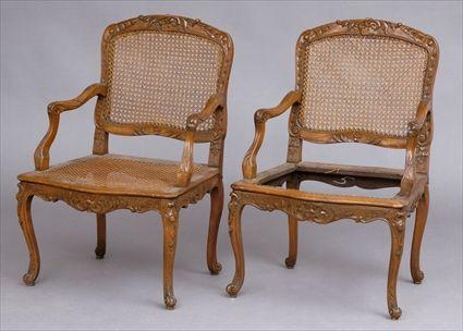 Appraisal: PAIR OF REGENCE-STYLE CARVED WALNUT FAUTEUILS A LA REINE Each