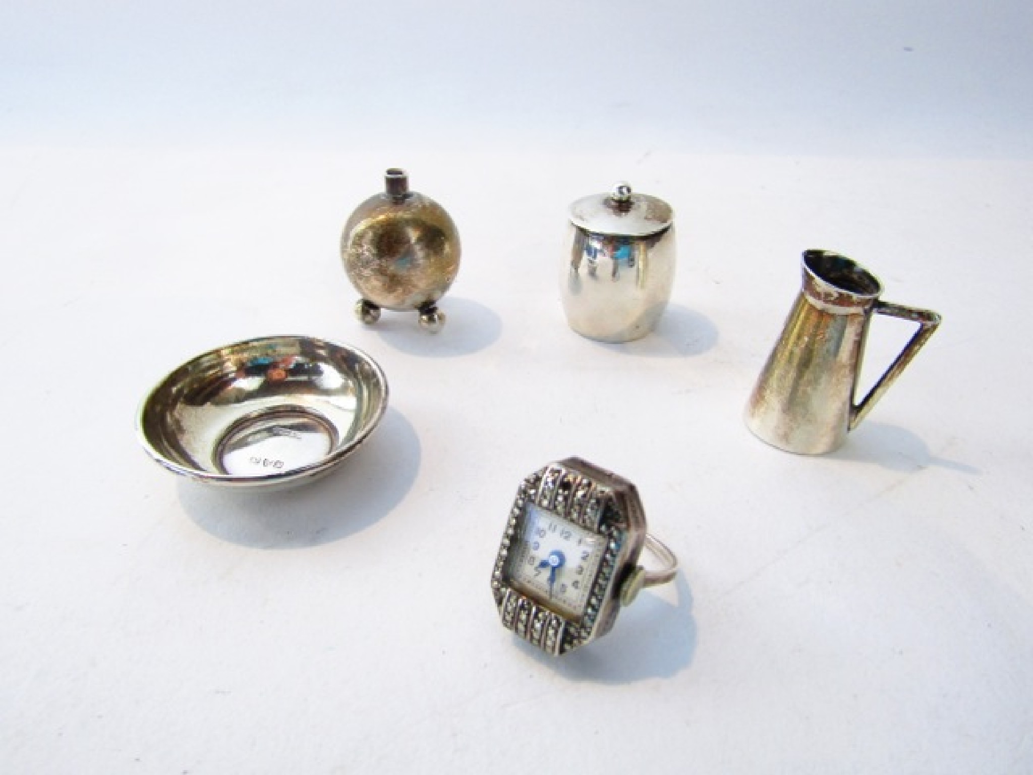 Appraisal: A collection of Edwardian silver miniatures Cornelius Desormeaux Saunders James