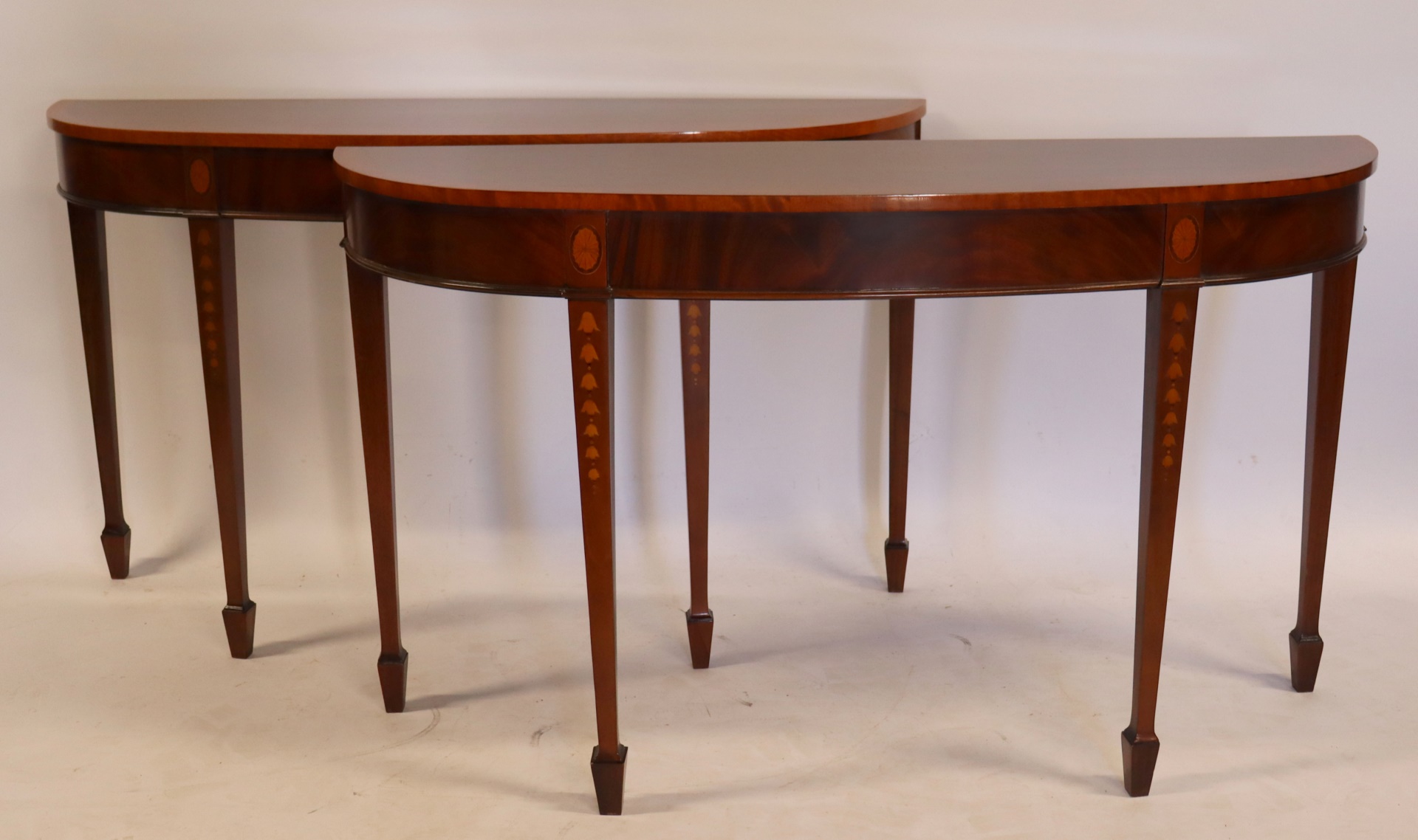 Appraisal: VINTAGE QUALITY PR OF MAHOGANY DEMILUNE CONSOLES A nice size