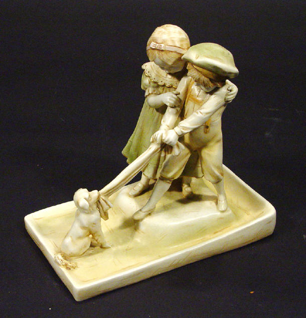 Appraisal: Royal Vienna Wahliss porcelain figure group of two children tugging