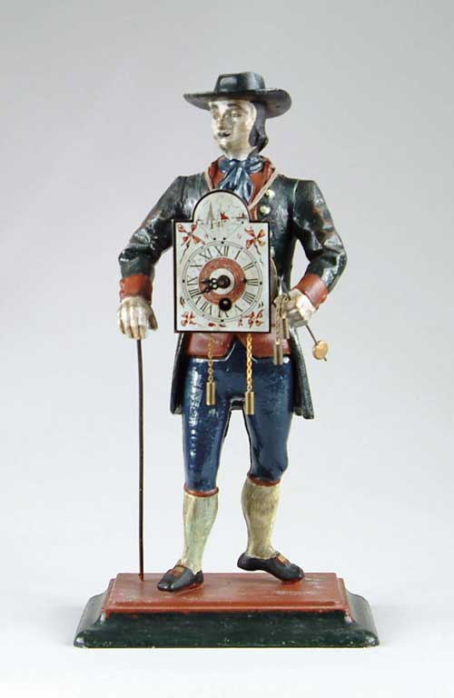 Appraisal: FIGURAL CLOCK PEDDLER CLOCK Polychrome decorated metal man with hat