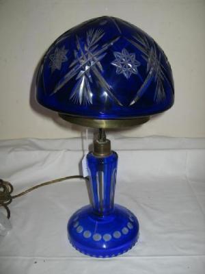 Appraisal: A BLUE CASED GLASS LAMP with domed shade cut with