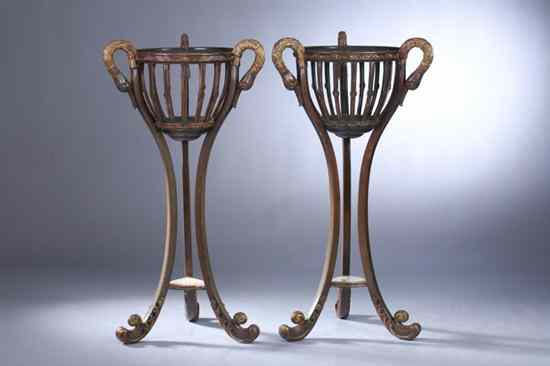 Appraisal: PAIR CLASSICAL STYLE MAHOGANY AND PARCEL-GILT JARDINI RES Bowl form