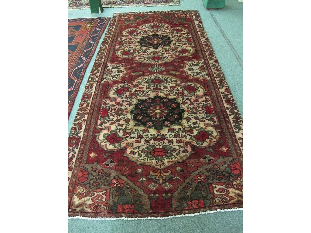 Appraisal: Hamadan multi coloured floor rug