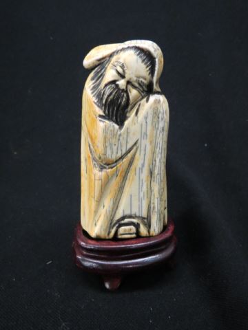 Appraisal: Chinese Carved Fossilized Ivory Figurine of a man signed plus