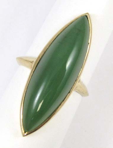 Appraisal: JADE AND FOURTEEN KARAT GOLD RING set with a marquise