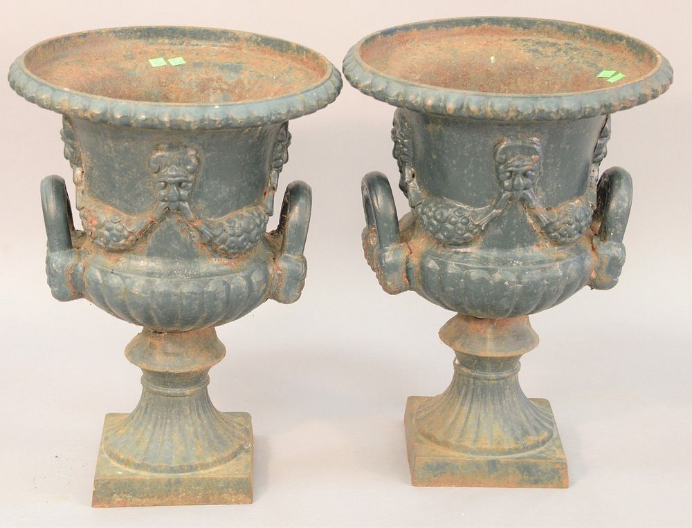 Appraisal: Pair iron outdoor urns ht dia Pair iron outdoor urns