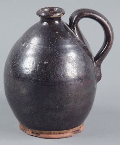 Appraisal: Small Early Redware Ovoid PitcherPennsylvania or Virginia Dark brown Albany