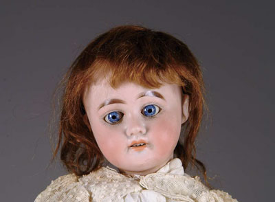 Appraisal: AM DOLL With blue glass sleep eyes a brown mohair