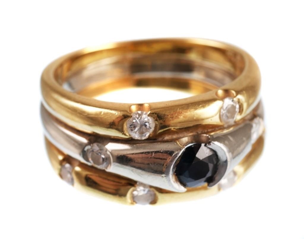 Appraisal: K white and yellow gold ring contains one round faceted