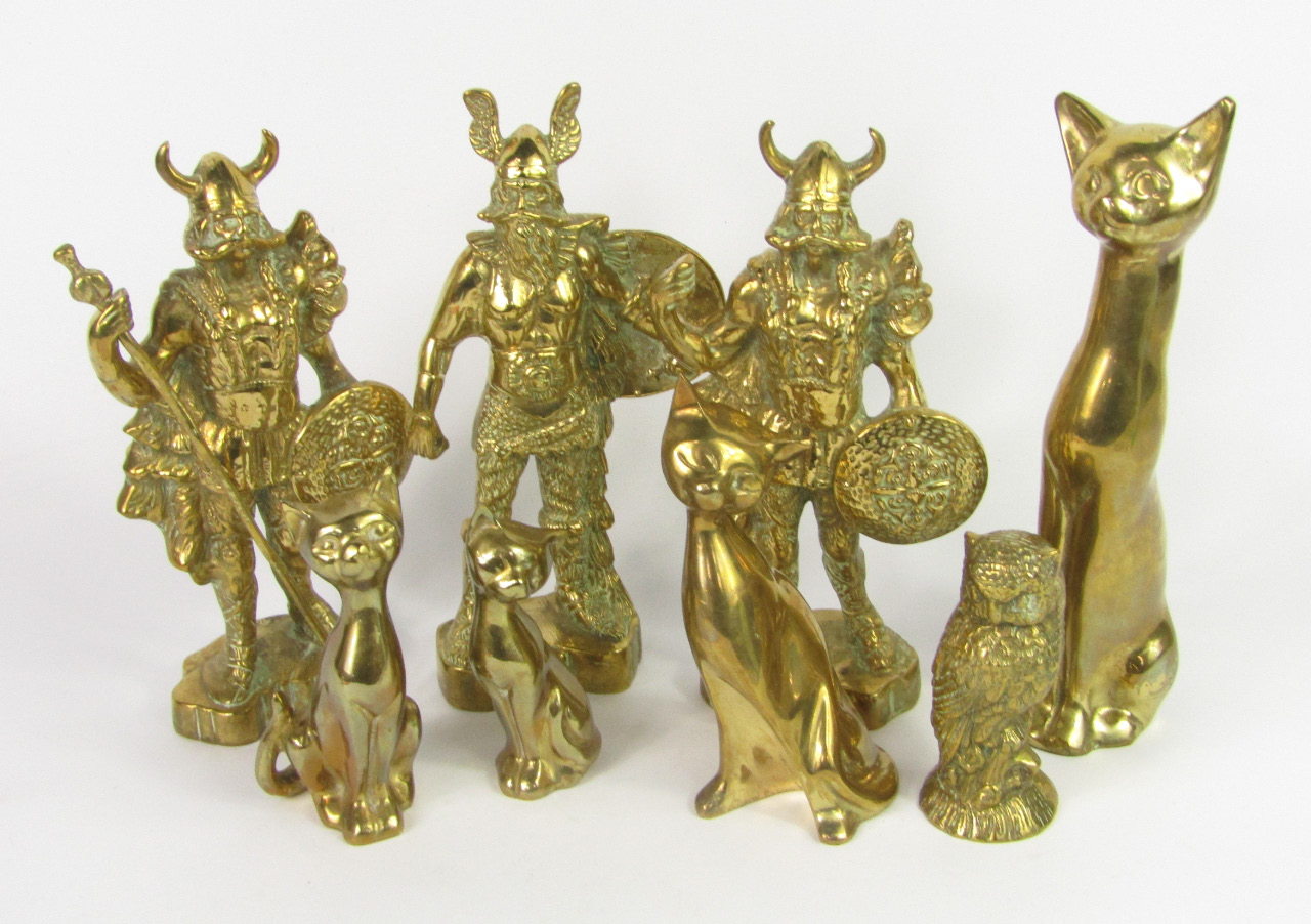 Appraisal: Three brass figures modelled as Vikings four brass figures of