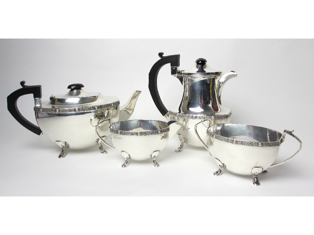 Appraisal: A four piece silver tea service of rounded rectangular form