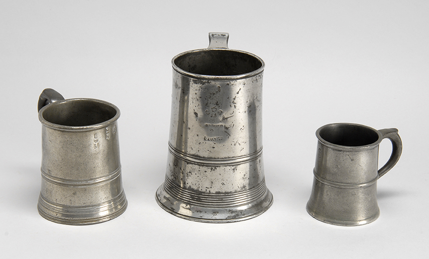 Appraisal: THREE ENGLISH PEWTER MUGS th CenturyQuart pint and half pint