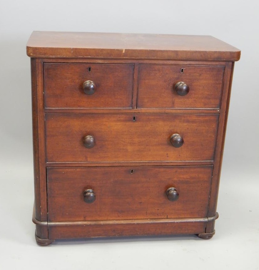 Appraisal: A Victorian mahogany chest of two short and two long