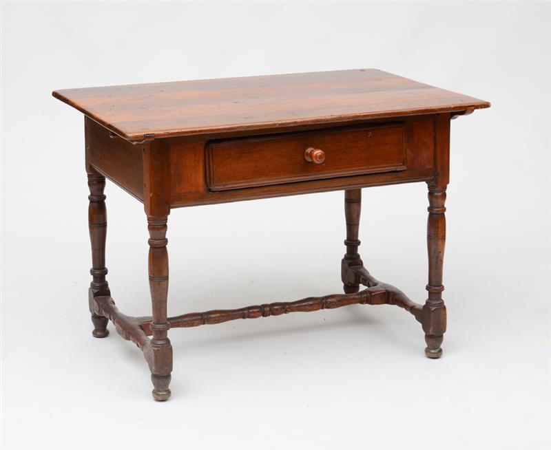 Appraisal: NEW ENGLAND STAINED PINE TAVERN TABLE Fitted with a frieze