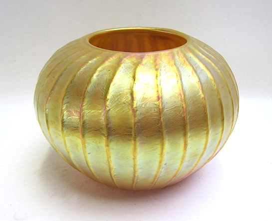 Appraisal: ART GLASS VASE by Lundberg Studios iridescent gold ribbed melon