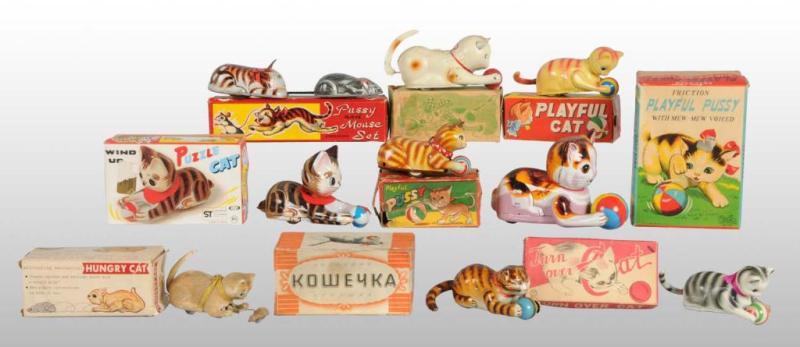 Appraisal: Lot of Tin Cat Friction Wind-Up Toys Description Japanese and