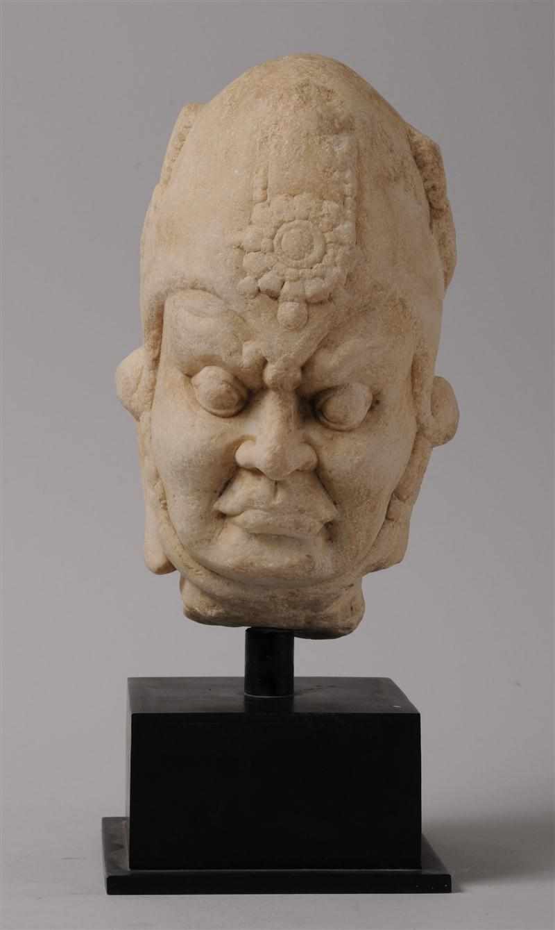 Appraisal: CHINESE CARVED MARBLE HEAD OF A LOKAPALA Modeled with a