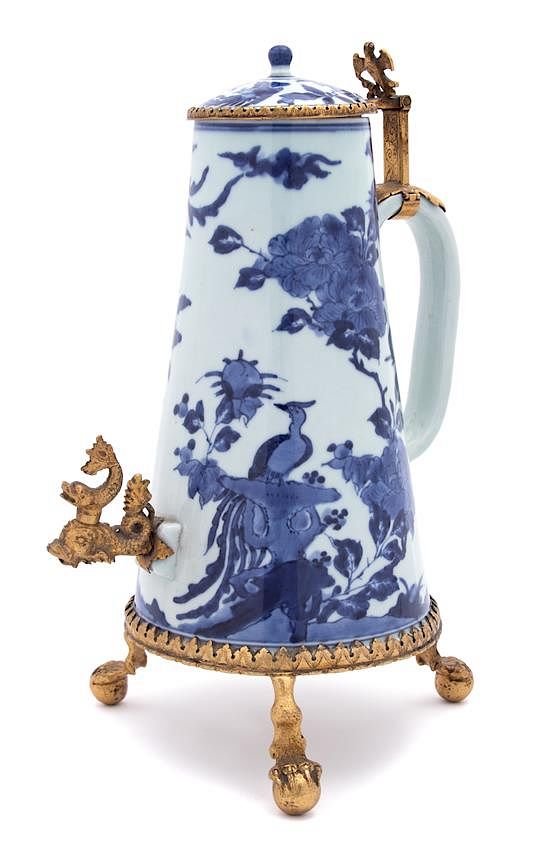 Appraisal: A Chinese Export Brass-Mounted Blue and White Porcelain Tea Urn