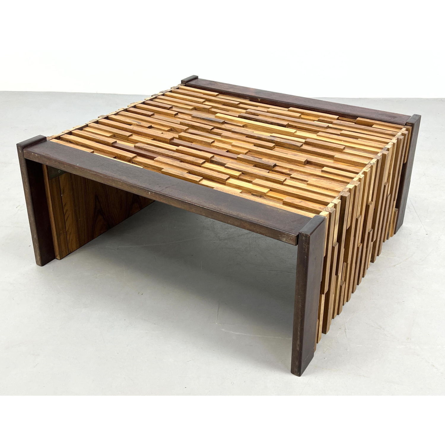 Appraisal: Brazilian PERCIVAL LAFER Sculptural Coffee Table Rosewood frame with mixed