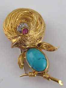 Appraisal: A French hallmarked carat gold bird brooch set with turquoise