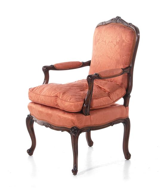 Appraisal: Louis XV style carved fruitwood fauteuil last half th century