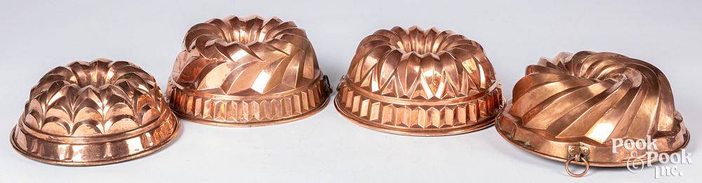 Appraisal: Four antique copper food molds Four antique copper food molds