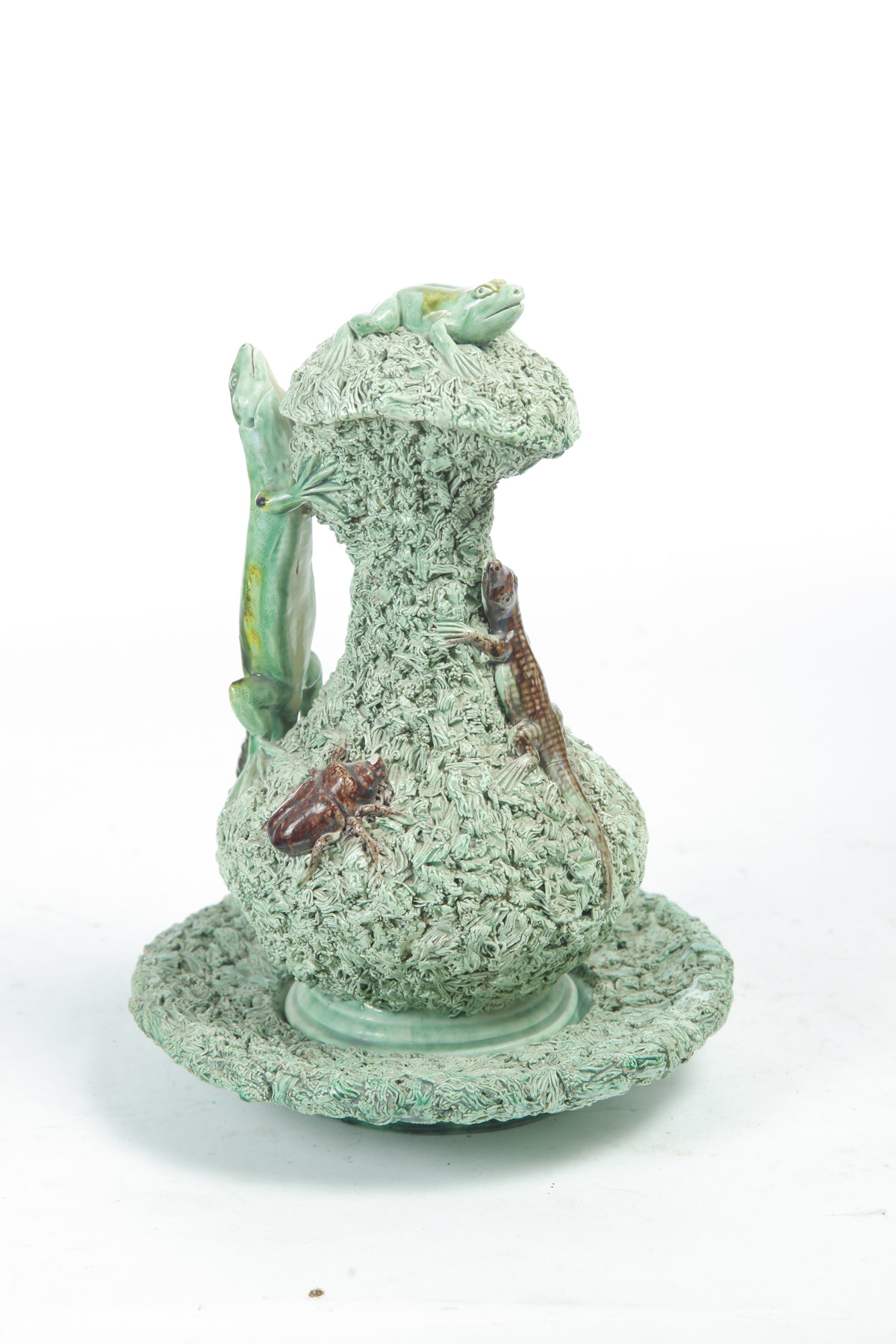 Appraisal: EUROPEAN PALLISY MAJOLICA EWER Late th century Green coleslaw covered