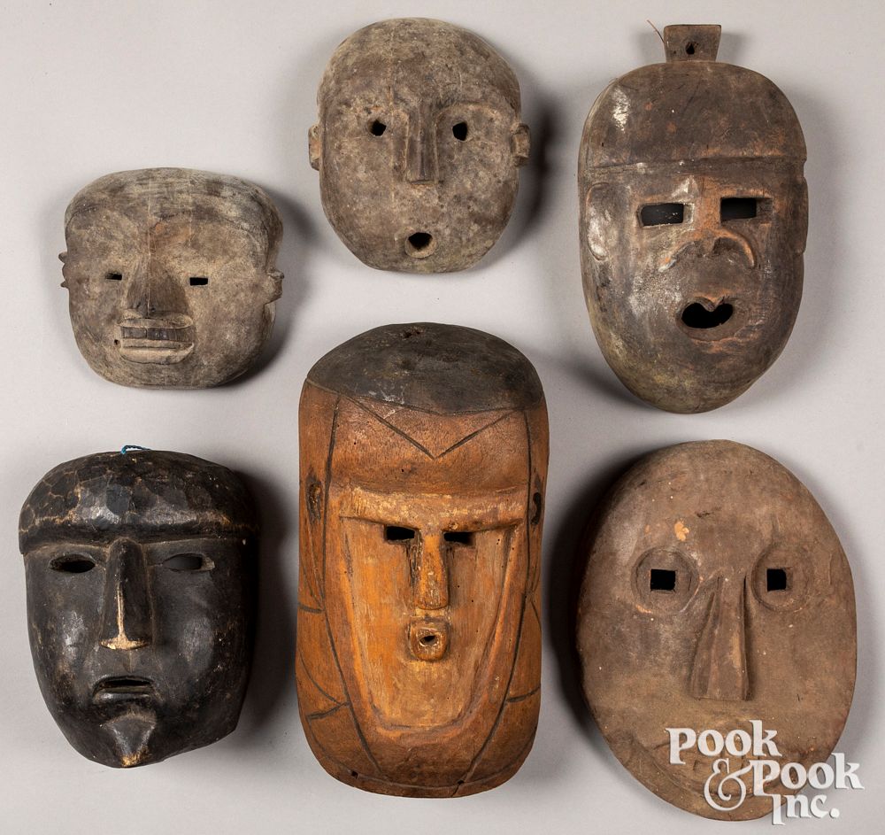 Appraisal: Six carved tribal masks Six carved tribal masks largest -