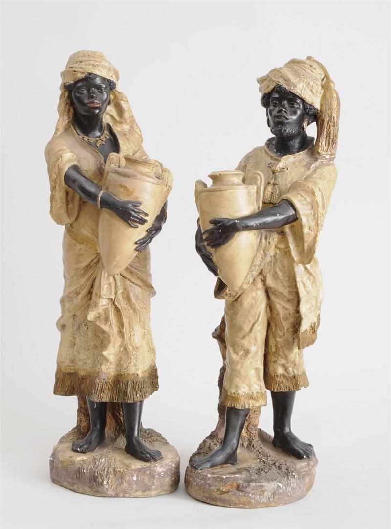 Appraisal: PAIR OF PAINTED PLASTER BLACKAMOOR FIGURES Modeled as a bare-foot